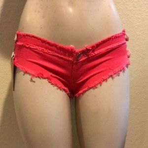 Pink denim booty shorts